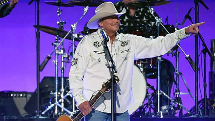 Alan Jackson pointing on stage