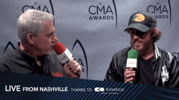 Chris Janson and Dave O'Brien talk at the CMA awards