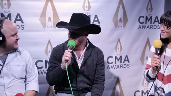 Cody Johnson talks with Ryan Wild and Cara at the CMA Awards
