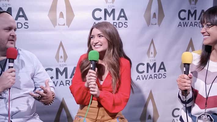 Tenille Townes talks with Ryan Wild and Cara at the CMA Awards