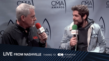 Thomas Rhett and Dave O'Brien talk at the CMA awards