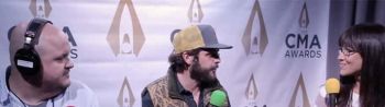 Thomas Rhett talks with Ryan Wild and Cara at the CMA Awards