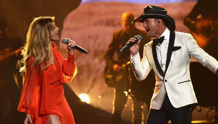 Faith Hill and Tim McGraw perform onstage at the 51st annual CMA Awards