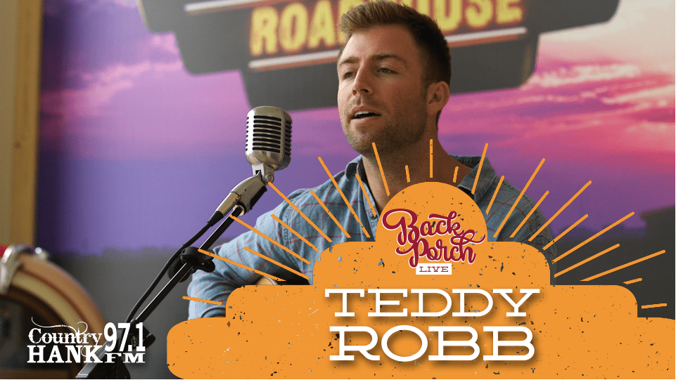 Teddy Robb singing into microphone at Back Porch Live