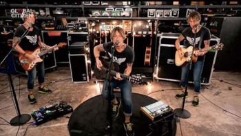 Keith Urban performing at home on the "One World: Together At Home" virtual concert series