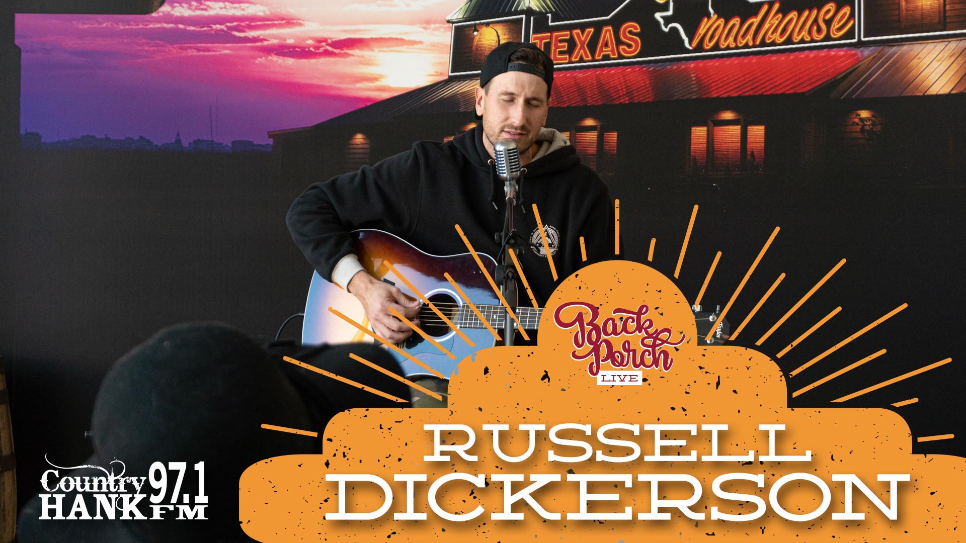 Russell Dickerson playing guitar in back porch live studio