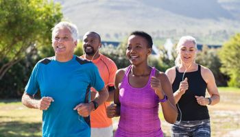 Healthy group of mature people jogging