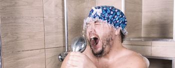 Funny fat man sings in the shower