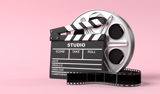 Film reel with clapperboard isolated on bright pink background