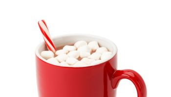 Red Mug of hot chocolate with candy cane and marshmellows