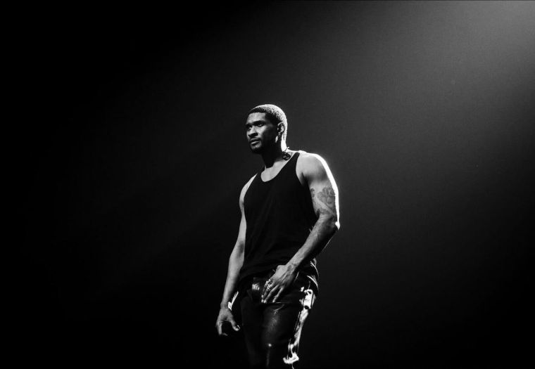 How many songs will Usher perform at halftime?
